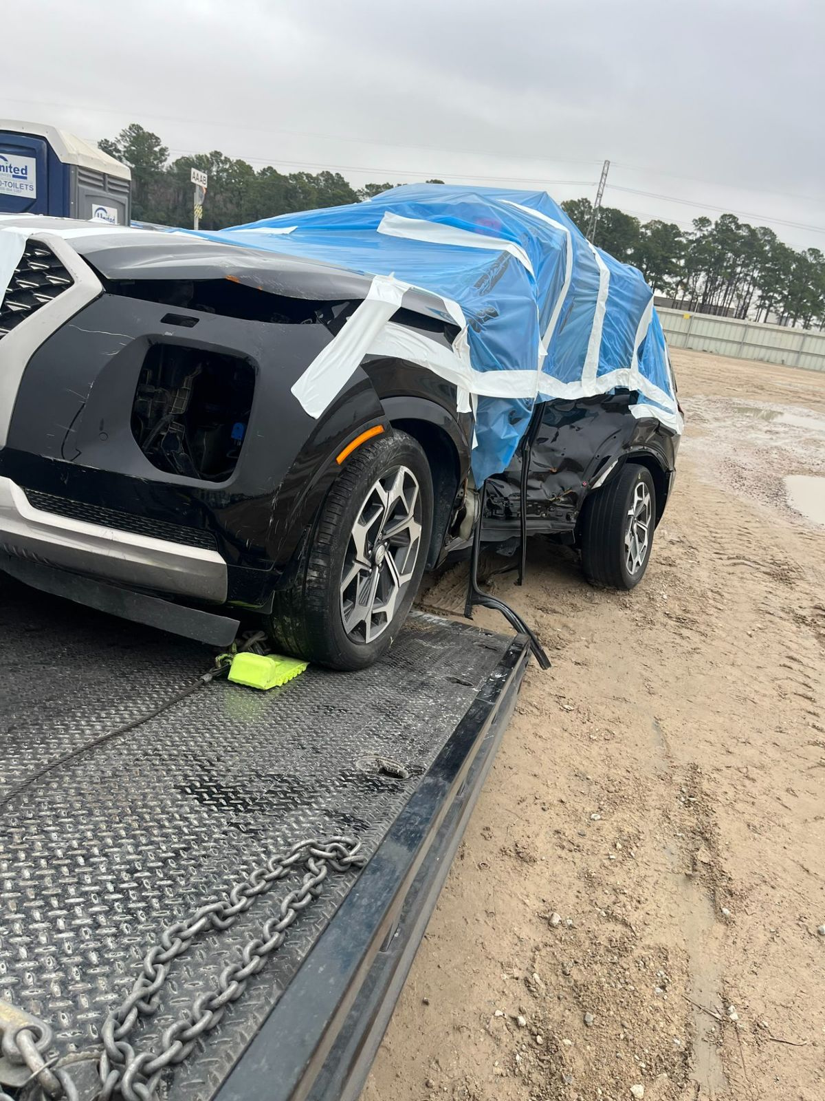 Tow truck recovering a vehicle after an accident in Houston, Texas